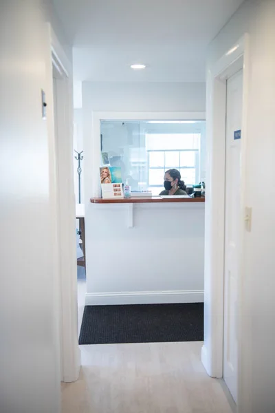 Hallway leading to the front desk at Town Hall Dental Spa